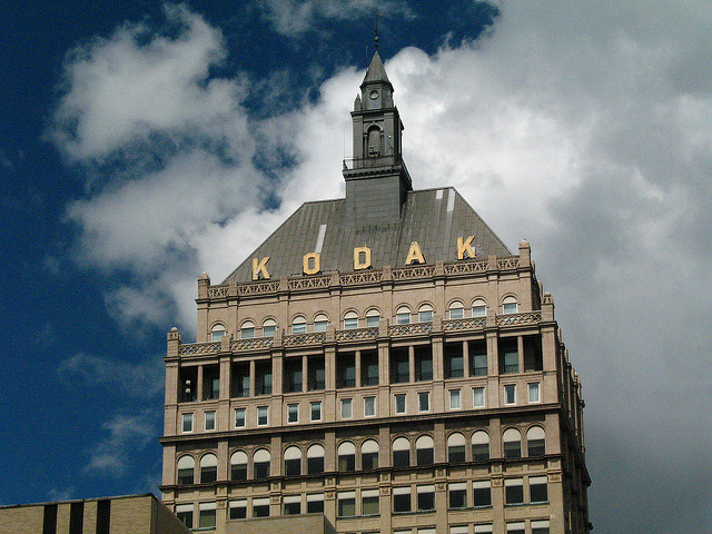 Kodak Tower, Photo Credit https://www.flickr.com/photos/dragonflyeye/2749250971/in/photolist-5bWCwP-bPoHQD-5c1Y6Q-UzKeij-9EQpFu-TysEm8-eYUHu-Ab7ApK-5cXpA-eY2SA-cKUF5b-5BCAyi-ocX2nE-o3Tu1m-nJtBwe-RYim7H-djL3tH-haeK6V-4vkcvT-ecpuBG-4ckfwS-NqxDfJ-e3GfLN-4vmJck-o1JZHm-nKynYY-5GpDT4-br6KGn-VTaQE2-8idcDk-8U7h89-77igLr-fqtPDJ-kKc6Qt-djL1NE-4Qm5ns-d742K5-nGQYga-iYLgn9-8xAkU1-8krVgC-dN7ijE-SNhSvU-7i6JqM-d5GN1w-iYLku7-e3AyC8-hBL7we-f5ya9U-p5bNkL